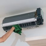 air-conditioner-being-cleaned-with-green-cleaning